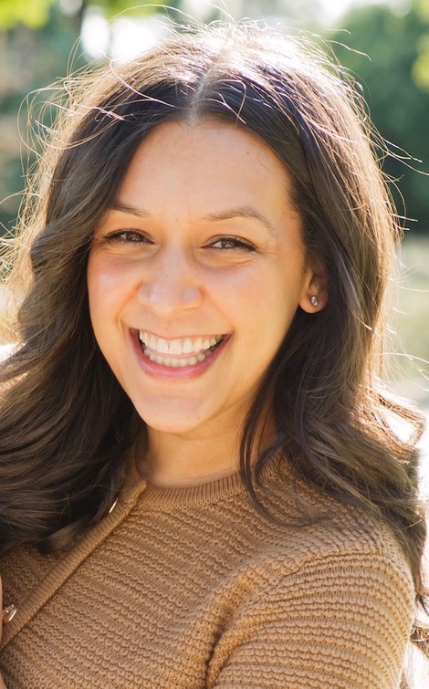 Katie Hay, CBS lactation consultant, smiling outdoors